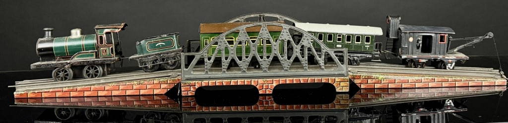c.1910 Marklin German Toy Key Wind Train: Wonderful Marklin Toy Train, Overall Beautiful Shape. Large Set usually you just find the Train and Tender. Length Set up Measures: 31" in Length. Winds and Works as it should.