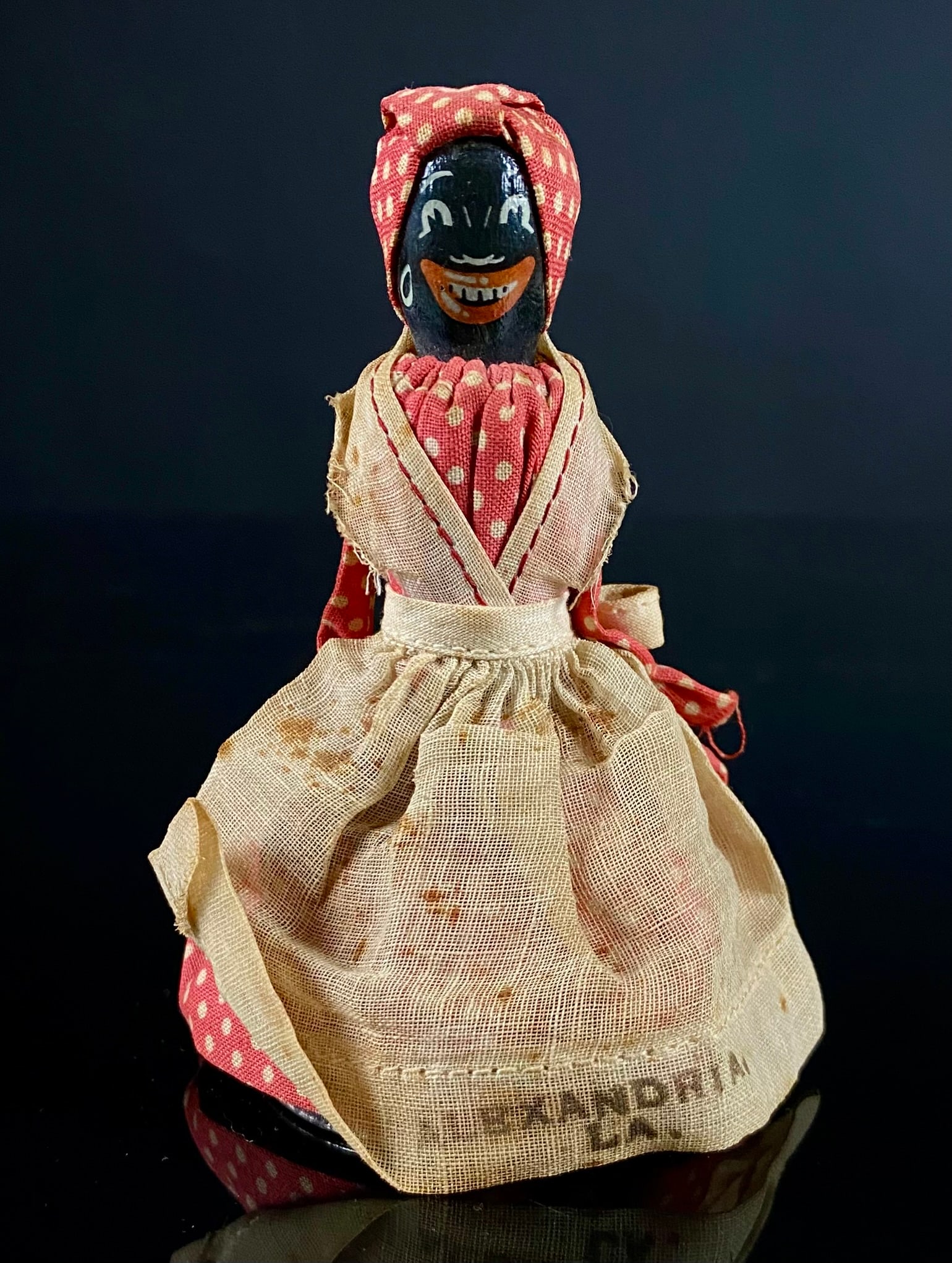 Vintage Black Americana 'Mammy' Bell Doll Souvenir, Alexandria, LA: A vintage Black Americana 'mammy' bell doll, commonly referred to as an Aunt Jemima tea bell souvenir. This item features a painted dark-toned head with caricatured and exaggerated features, including