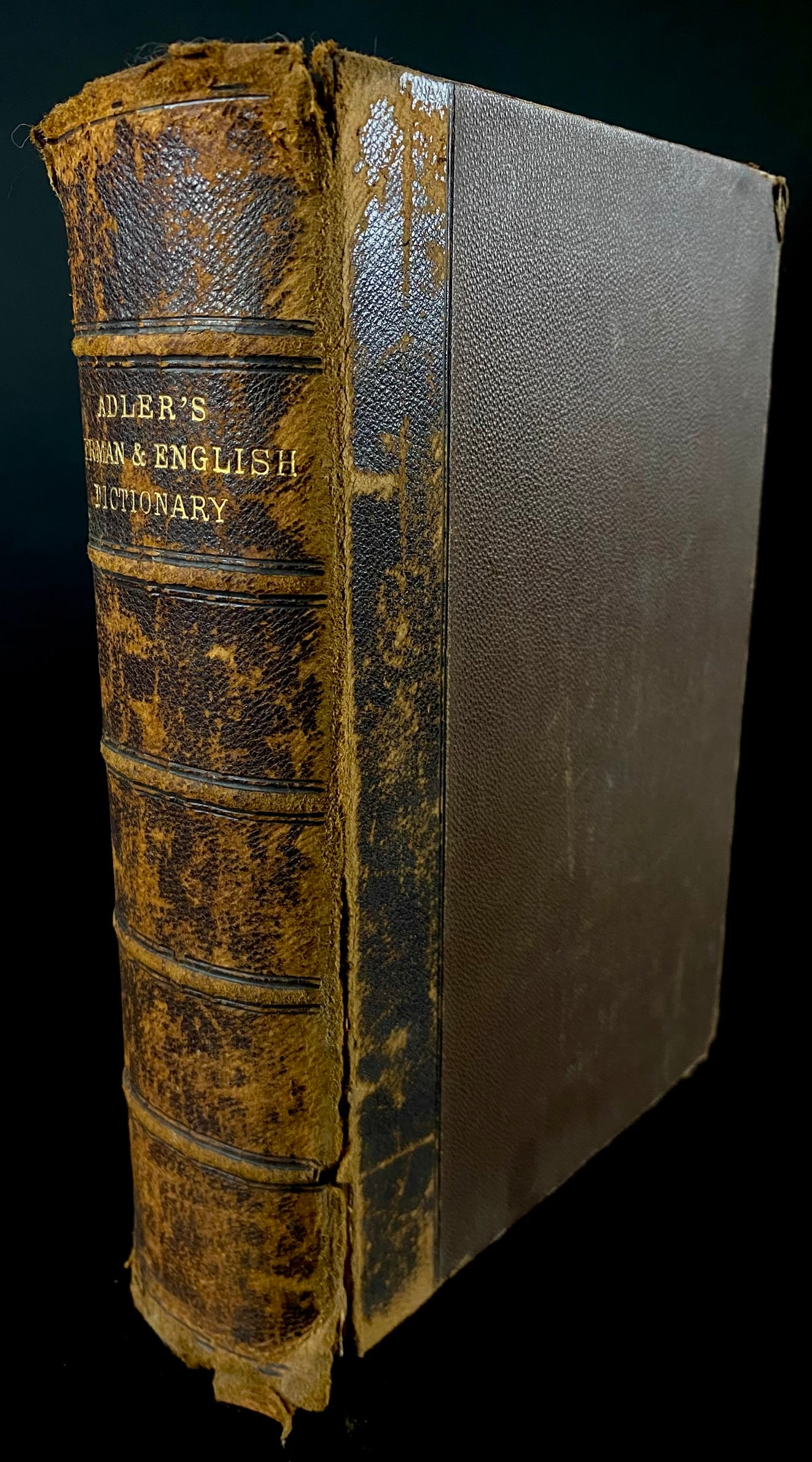 G. J. Adler, A Dictionary of the German and English Languages, D. Appleton and Company, 1891: A Dictionary of the German and English Languages by G. J. Adler, published by D. Appleton and Company, New York, in 1891. This large 19th-century dictionary features a half-leather binding with paper-