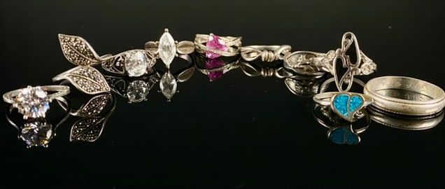 A Collection of Ten Sterling Silver Rings, Mixed Designs
