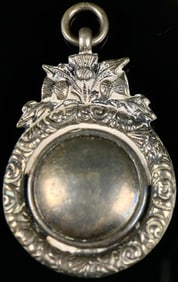 An English Sterling Silver Fob Medal by W.A. Adams Ltd., featuring a Scottish Thistle Design
