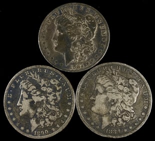 Three United States Morgan Silver Dollars, 1884 and 1890