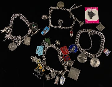 Five Vintage Sterling Silver Charm Bracelets and a Group of Loose Charms
