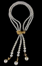 A Vintage Three-Strand Imitation Pearl Necklace with Hand Clasp