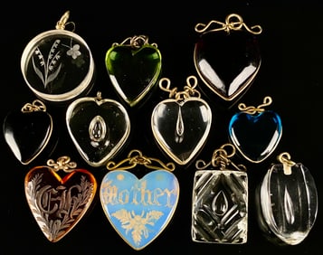 A Collection of Carder Steuben Glass and Rock Crystal Pendants and Lockets