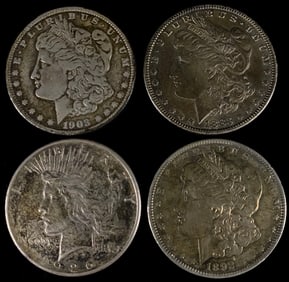 Four United States Silver Dollars: Three Morgan Dollars (1883, 1892, 1903) and One Peace Dollar
