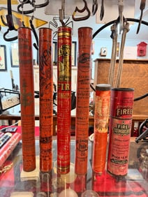 A Collection of Vintage Dry Powder Tin Tube Fire Extinguishers