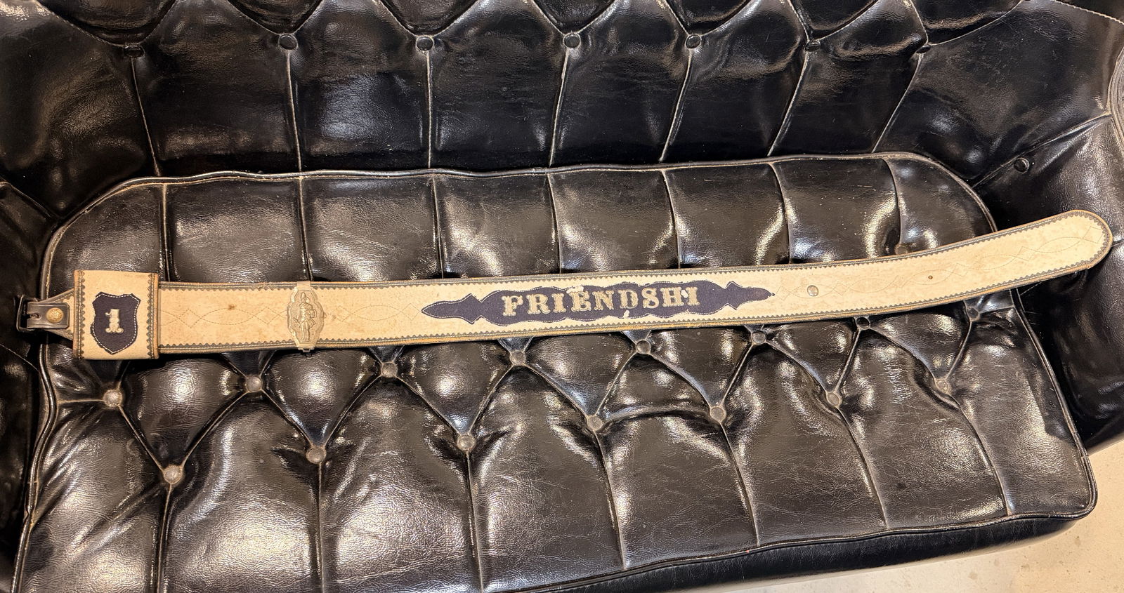 Friendship NY Leather Parade Belt No 1 Badge: Friendship NY Parade Belt Overall Good shape, missing the letter "P"