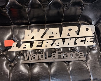 A Pair of Ward LaFrance Fire Apparatus Emblems