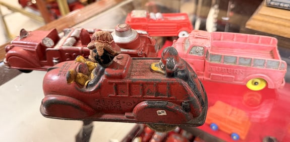 A Group of Vintage 1930s Walt Disney Sun Rubber and Auburn Rubber Toy Fire Engines and Trucks