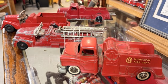 A Group of Four Vintage Hubley and Tru-Scale Pressed Steel Fire Trucks