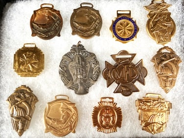 A Collection of Vintage American Firefighting Convention Medals and Fobs