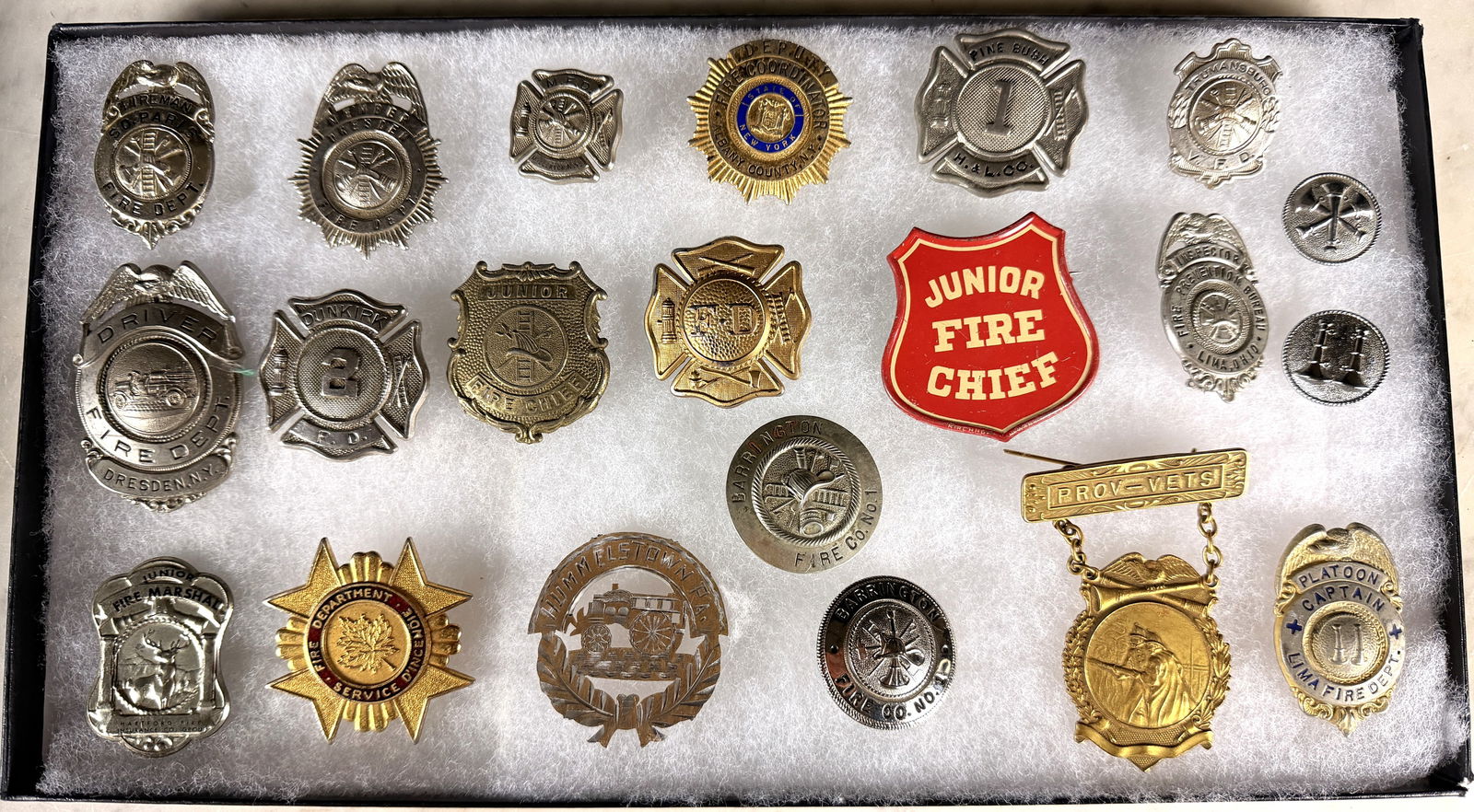 A Collection of Vintage and Obsolete American Fire Service and Junior Fire Chief Badges and Pins (1 of 15)