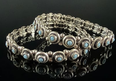 Pair of Vintage Silver-Toned Metal Stretch Bracelets with Light Blue Cabochons