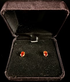 14K Yellow Gold Stud Earrings Featuring Reddish-Orange Oval Gemstones