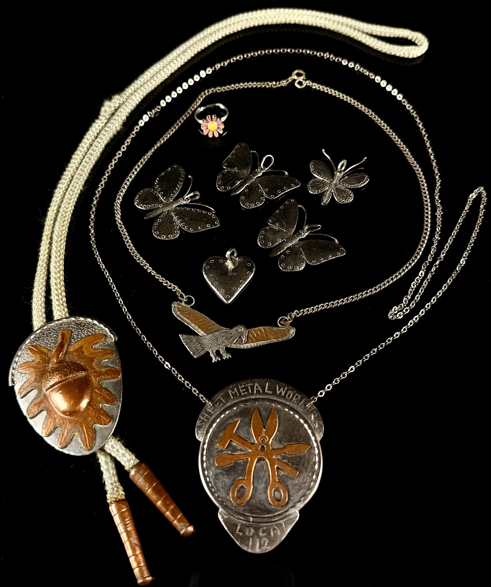 A Collection of 12 Pieces of Hand Hammered Folk Art Jewelry in Copper and Aluminum (1 of 7)