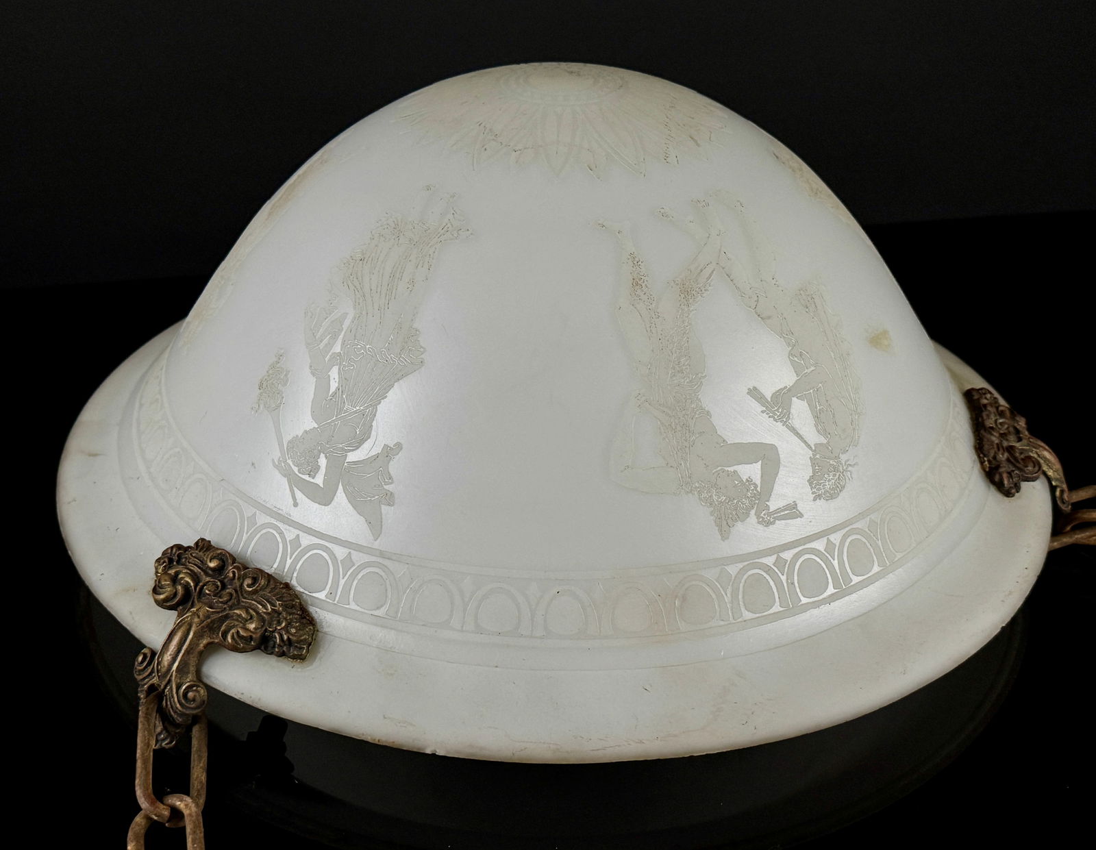 Steuben Calcite Acid-Etched Inverted Dome Ceiling Light Fixture: A single inverted dome ceiling light fixture attributed to Steuben, crafted from opaque white opal or Calcite art glass. The shade is suspended by three ornate patinated brass or bronze fittings and a