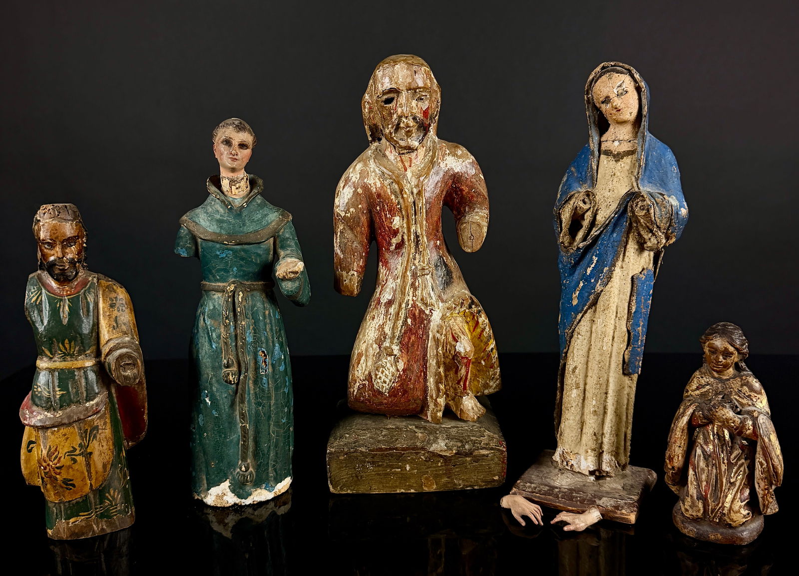 A Collection of Five Spanish Colonial Polychrome Wood Santos Figures (1 of 15)
