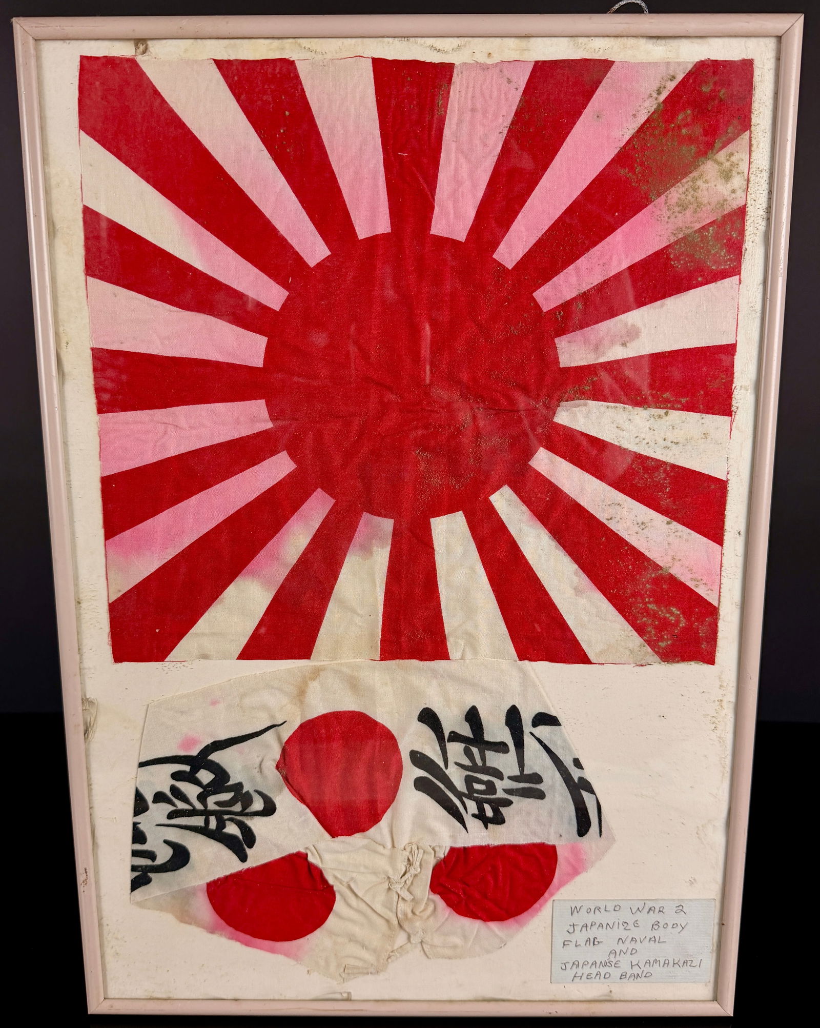 Framed Collection of Two WWII Imperial Japanese Military Textile Fragments: Rising Sun Flag and (1 of 7)