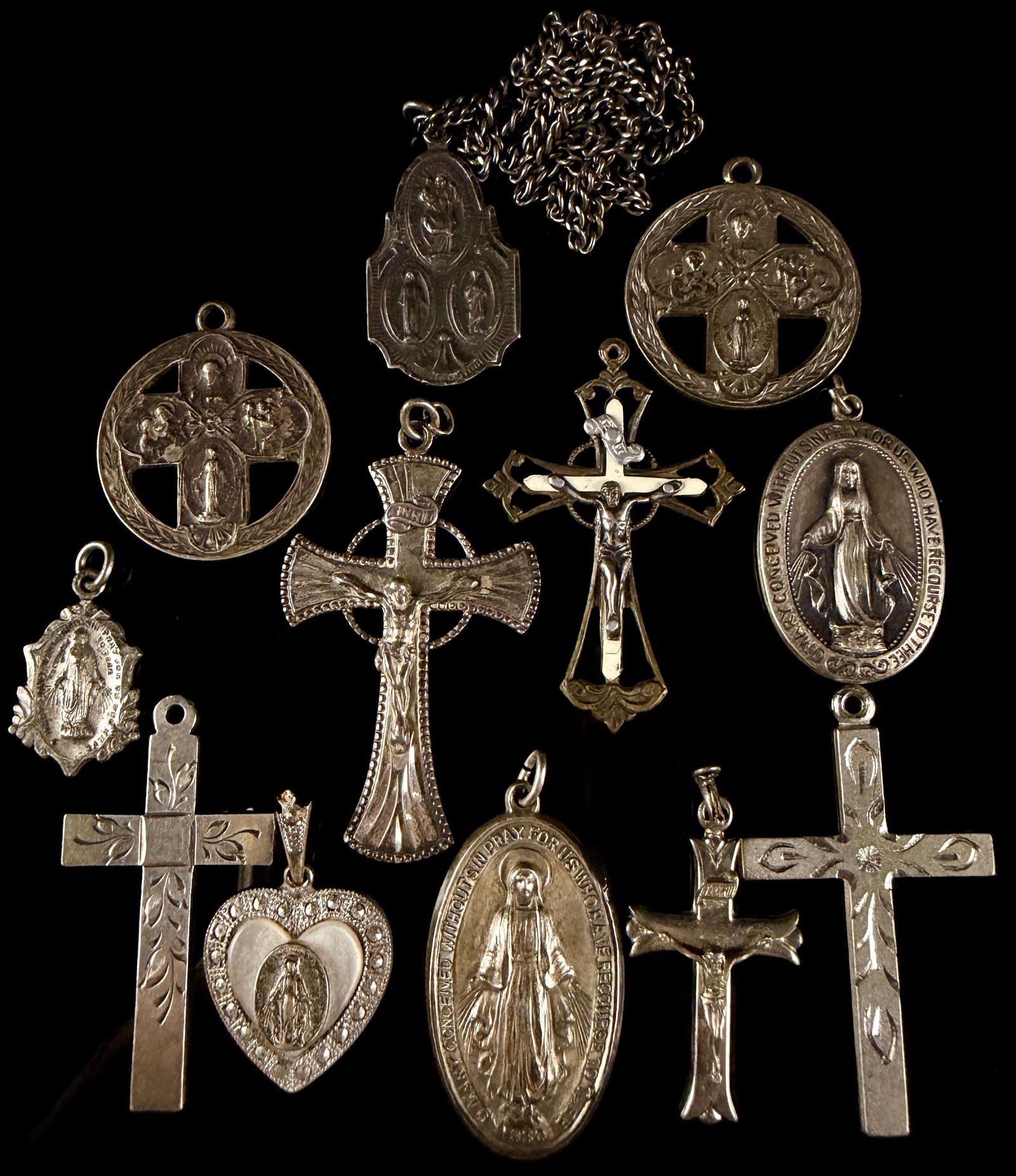 A Collection of Vintage Sterling Silver Religious Medals and Crucifixes (1 of 11)