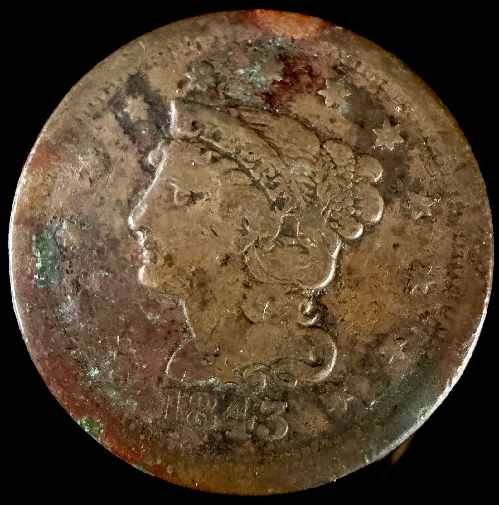1843 Braided Hair Liberty Head Large Cent: An 1843 United States Braided Hair Large Cent struck in copper. The obverse features a left-facing profile of Liberty wearing a coronet inscribed with LIBERTY, surrounded by thirteen stars with the da