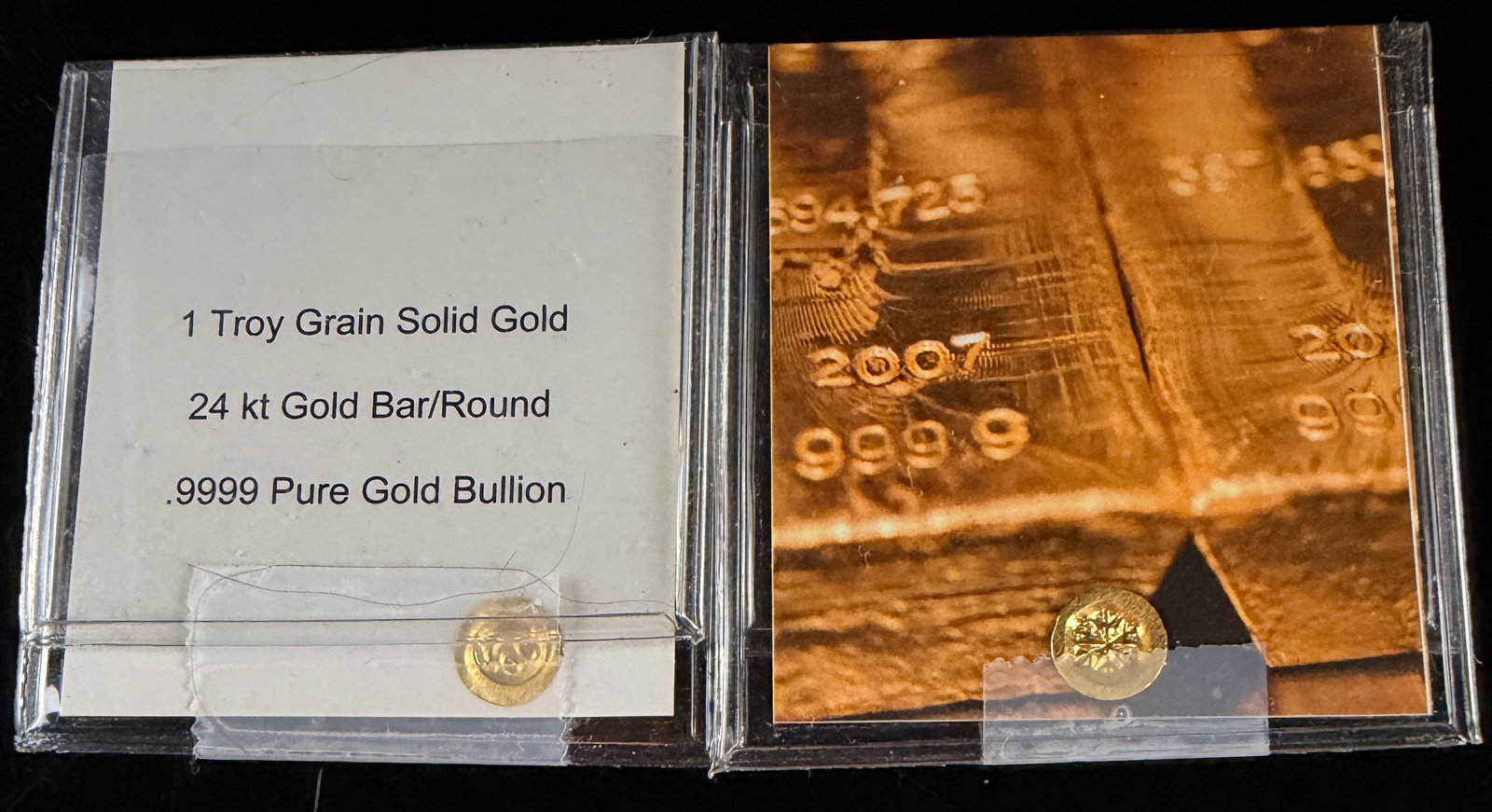 Two 1 Troy Grain .9999 Pure Gold Bullion Rounds: Two miniature gold bullion rounds, each accompanied by a printed identification card and housed in a clear plastic protective flip. The identification cards specify that each item is 1 Troy Grain Soli