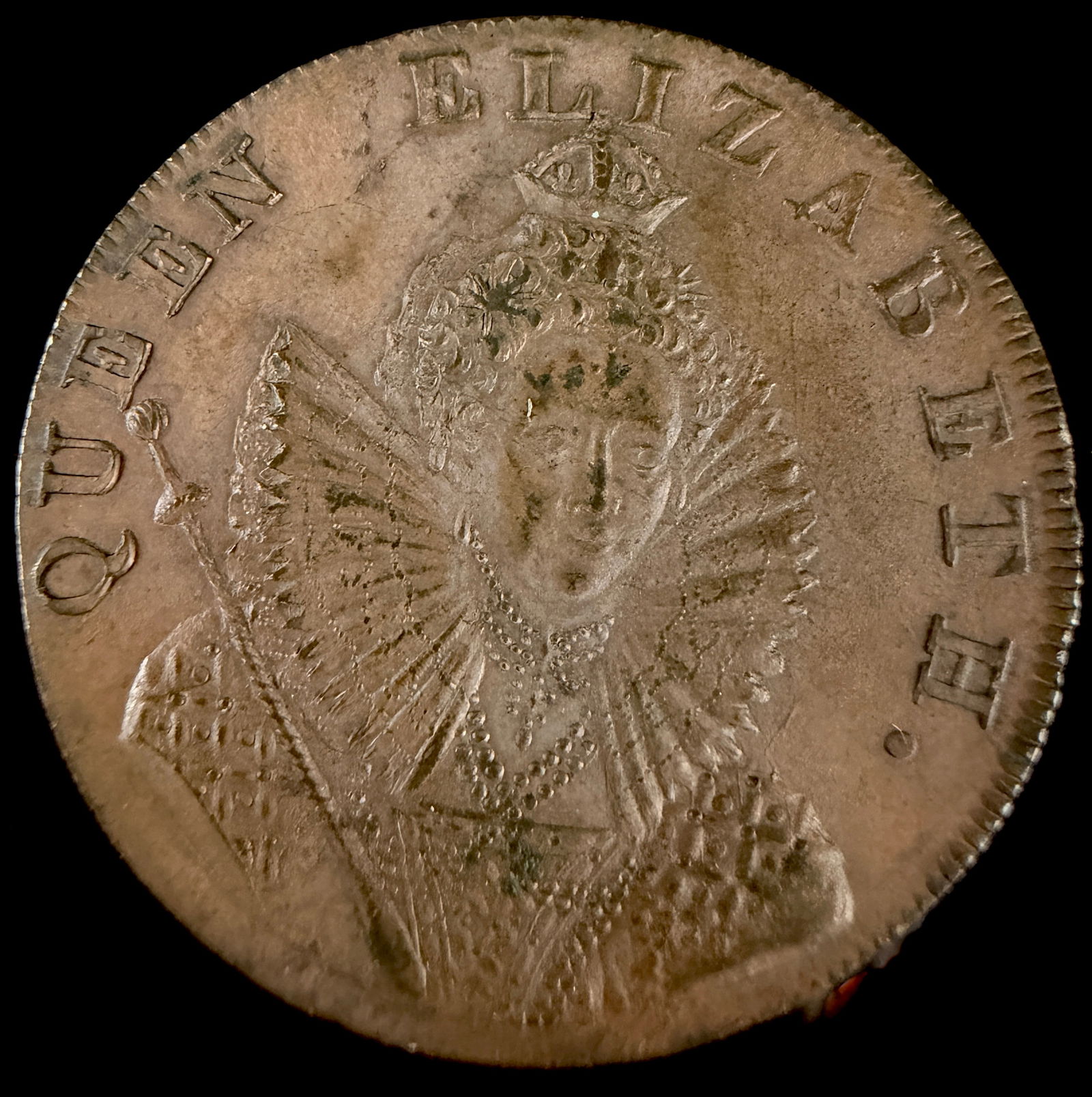 1794 Sussex Chichester Halfpenny Conder Token Queen Elizabeth I: This 1794 Sussex Chichester halfpenny token is a copper alloy Conder token. The obverse features a stylized front-facing portrait of Queen Elizabeth I wearing a crown and a high ruff collar while hold