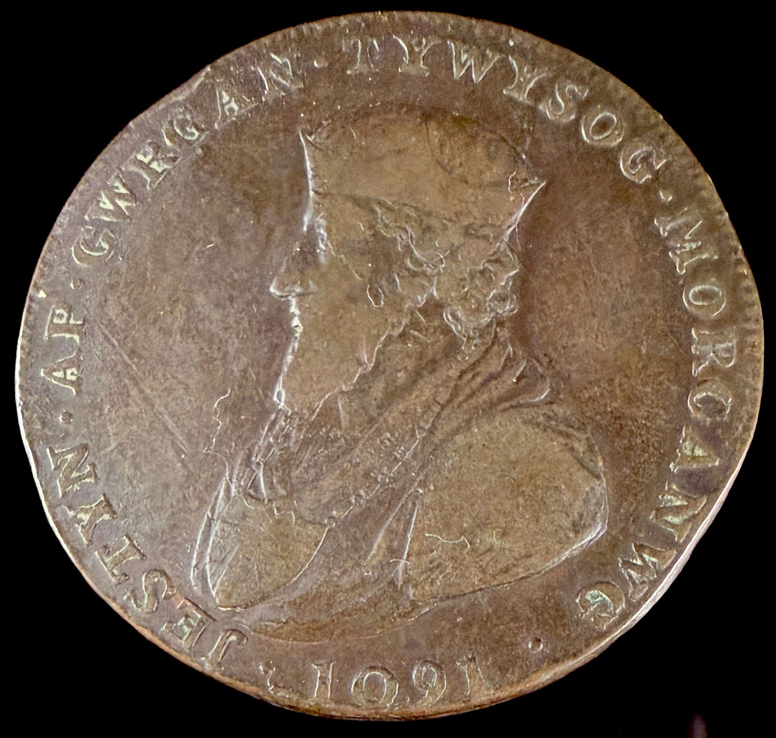 Wales Glamorgan Halfpenny Conder Token 1795: A copper alloy Wales Glamorgan halfpenny Conder token, issued circa 1795. The obverse features a left-facing profile bust of Iestyn ap Gwrgan, Prince of Glamorgan, with the Welsh inscription IESTYN AP