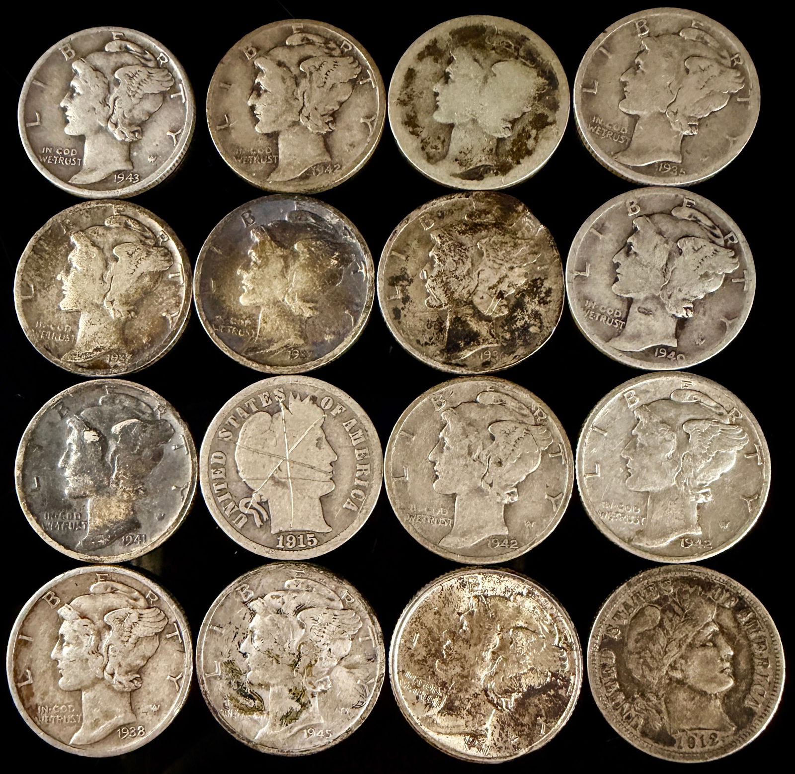 A Collection of United States Mercury and Barber Silver Dimes: A collection of United States silver dimes featuring the Mercury (Winged Liberty Head) and Barber designs. The group includes various mint dates spanning the early to mid-20th century, with visible ye