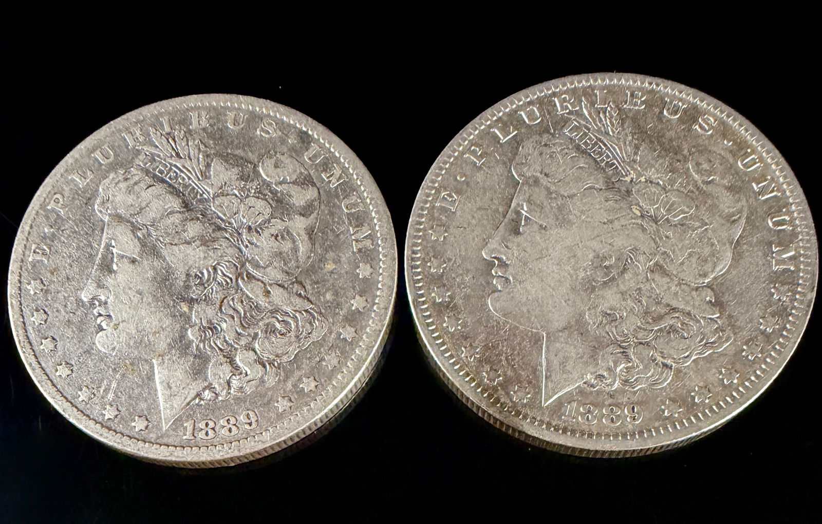A Pair of 1889-O Morgan Silver Dollars (1 of 5)