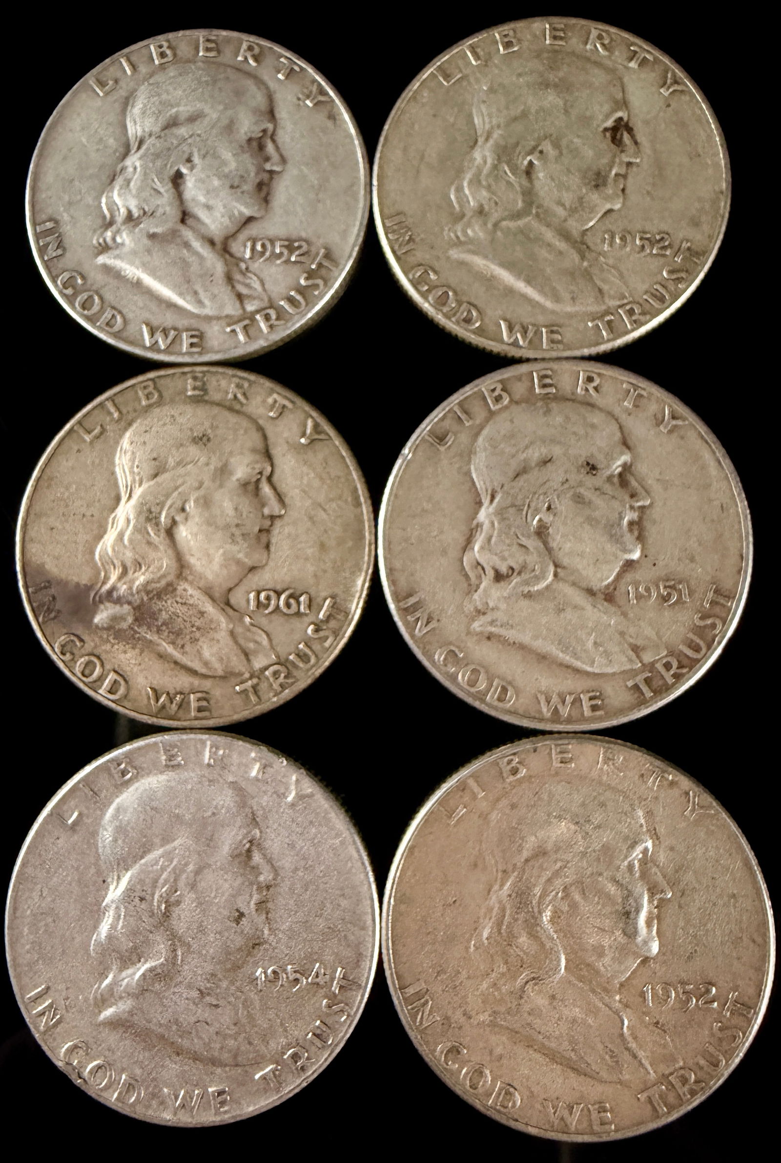 A Collection of United States Franklin Silver Half Dollars (1 of 13)