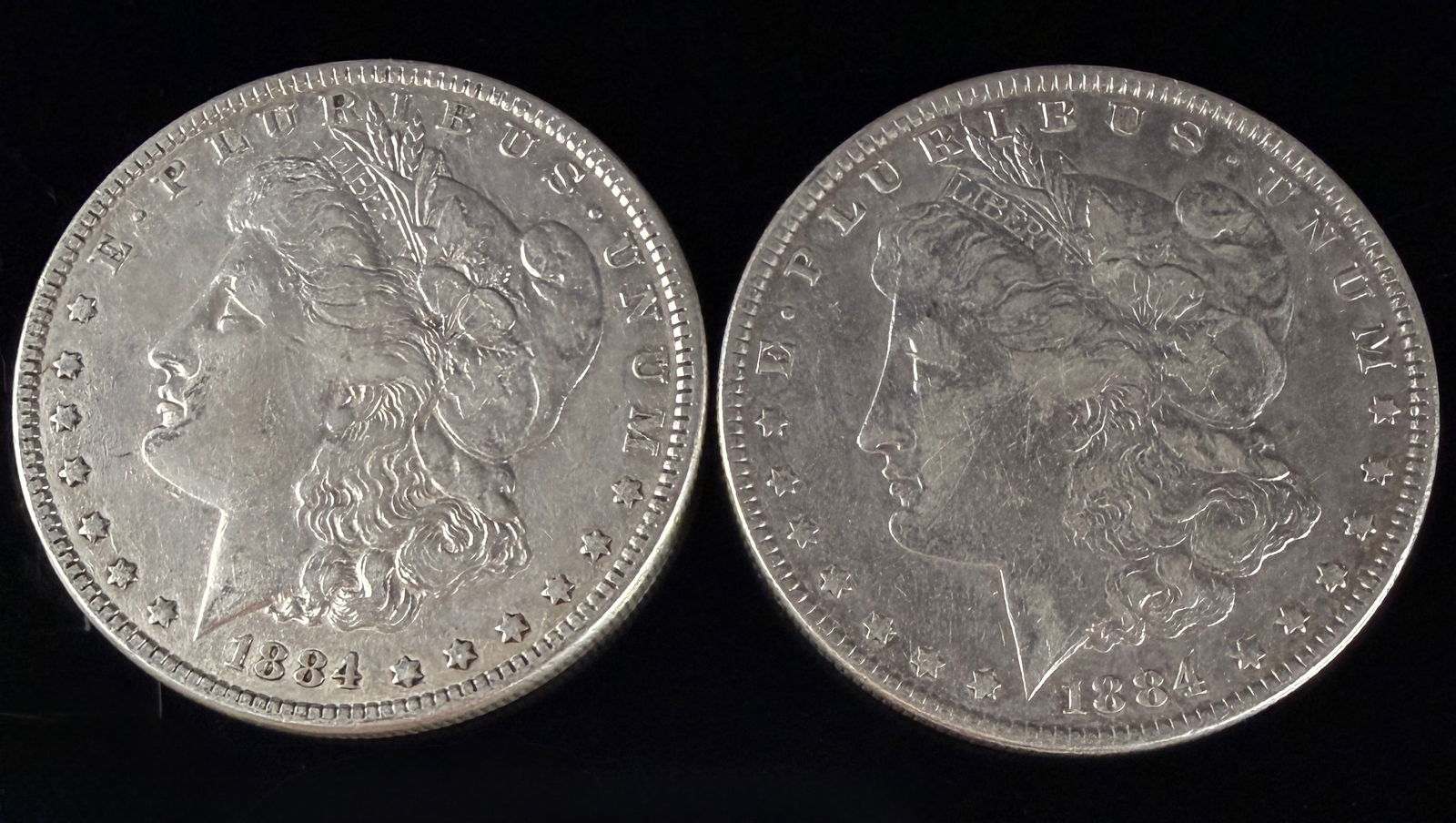 A Pair of 1884 Morgan Silver Dollars (1 of 5)