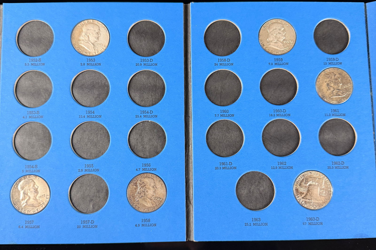 A Collection of United States Franklin Half Dollars in a Whitman Coin Folder (1 of 8)