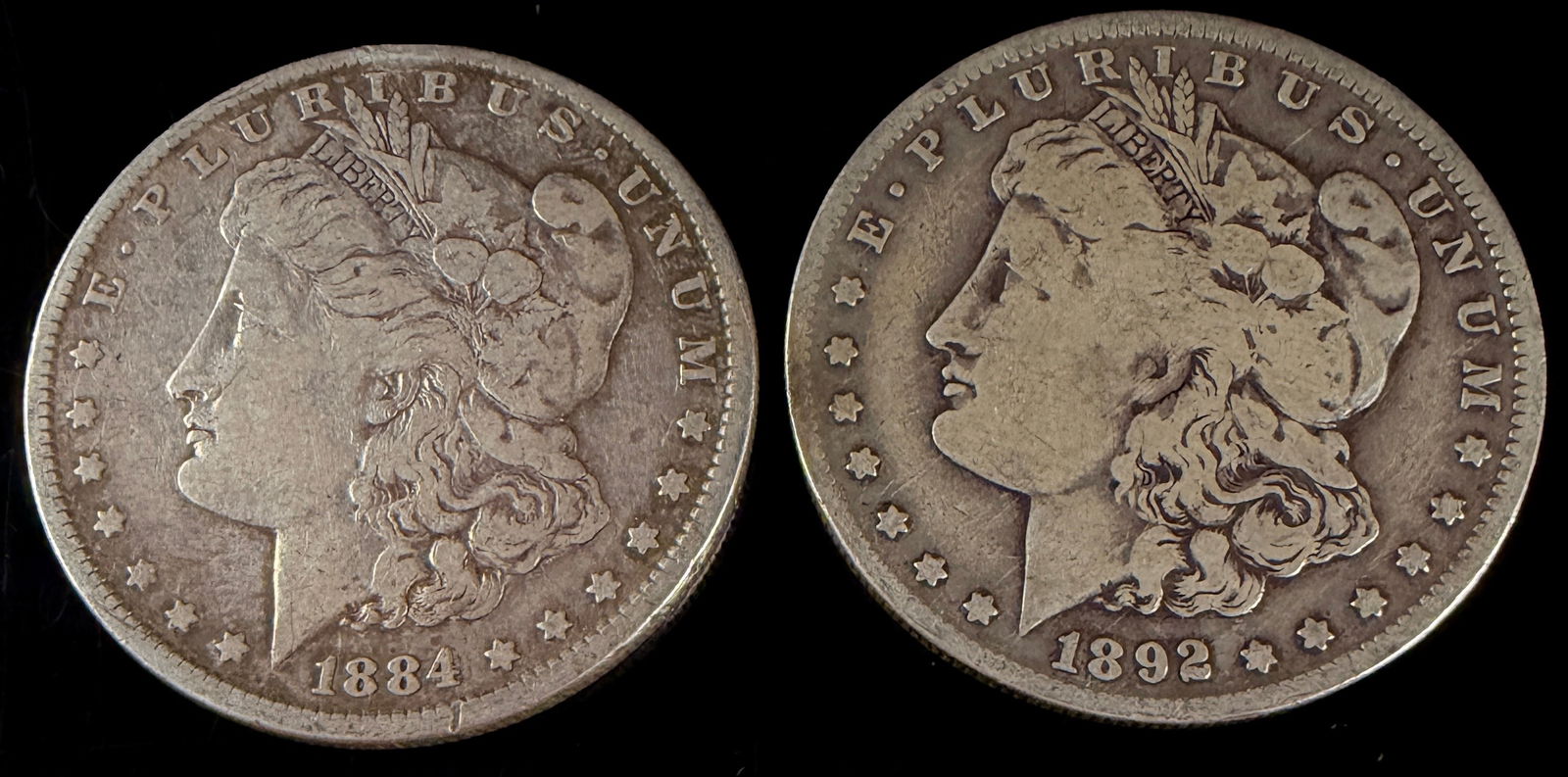 A Pair of United States Morgan Silver Dollars, 1884 and 1892-O (1 of 6)