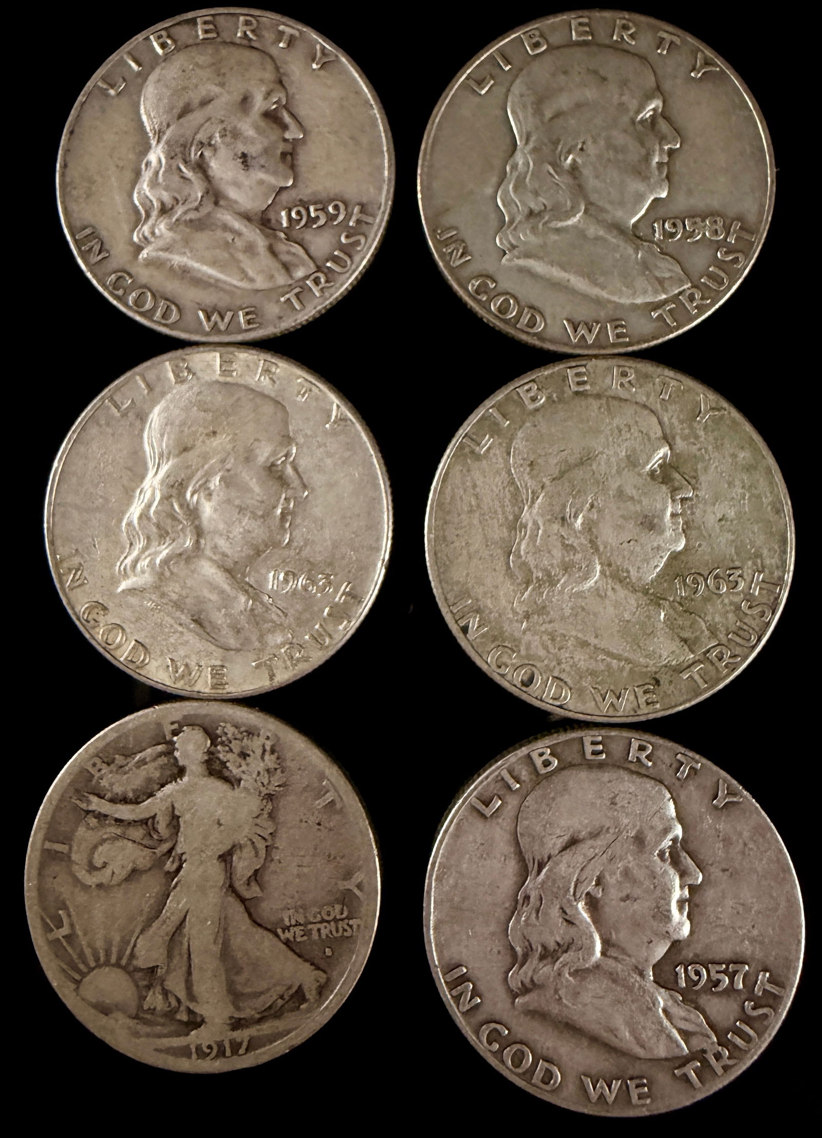 A Collection of United States Walking Liberty and Franklin Silver Half Dollars (1 of 14)