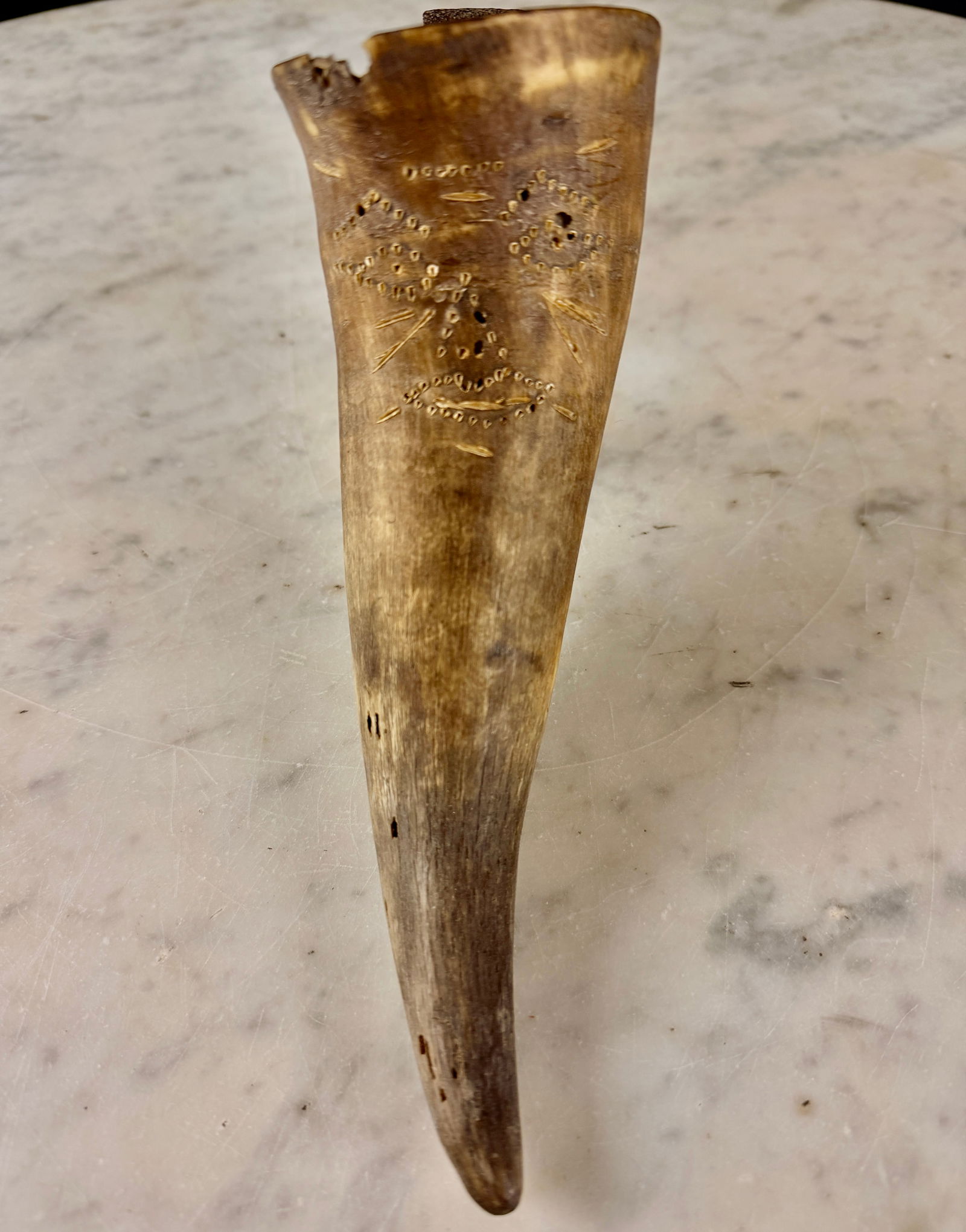 19th Century Carved Bovine Horn Scythe Stone Holder: This antique utilitarian folk art object is a scythe stone holder, also known as a mower's horn, likely dating to the 19th century. The piece is fashioned from a natural bovine horn and includes an