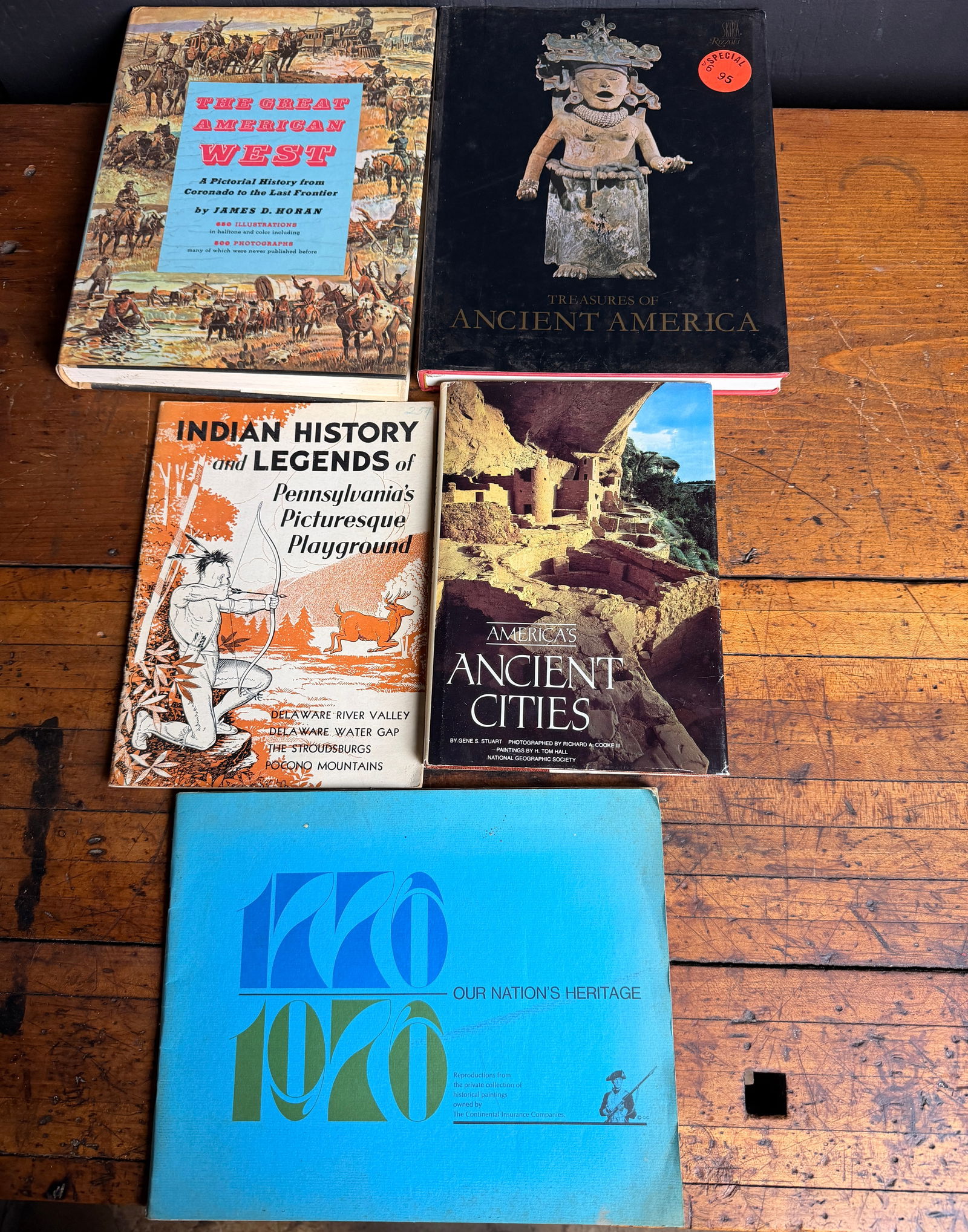 A Collection of Books on American History and Ancient Civilizations: This collection comprises several publications focused on the history of the Americas and ancient cultures. The group includes The Great American West by James D. Horan, published by Bonanza Books in