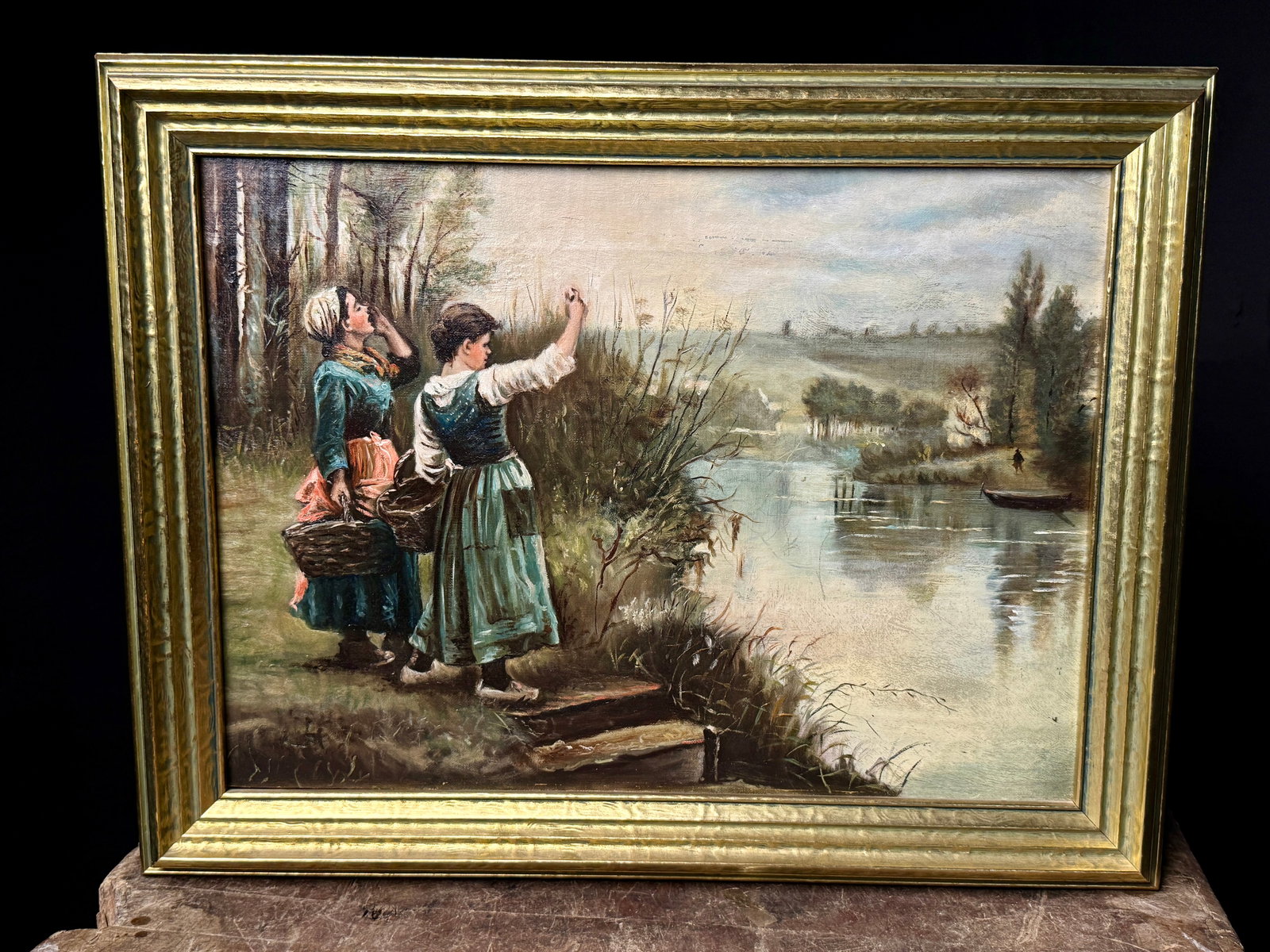 After Daniel Ridgway Knight, Hailing the Ferry, Oil on Canvas: This oil on canvas painting is an early 20th-century copy of the 1885 composition titled Hailing the Ferry by Daniel Ridgway Knight. The work depicts two women in traditional peasant attire standing o