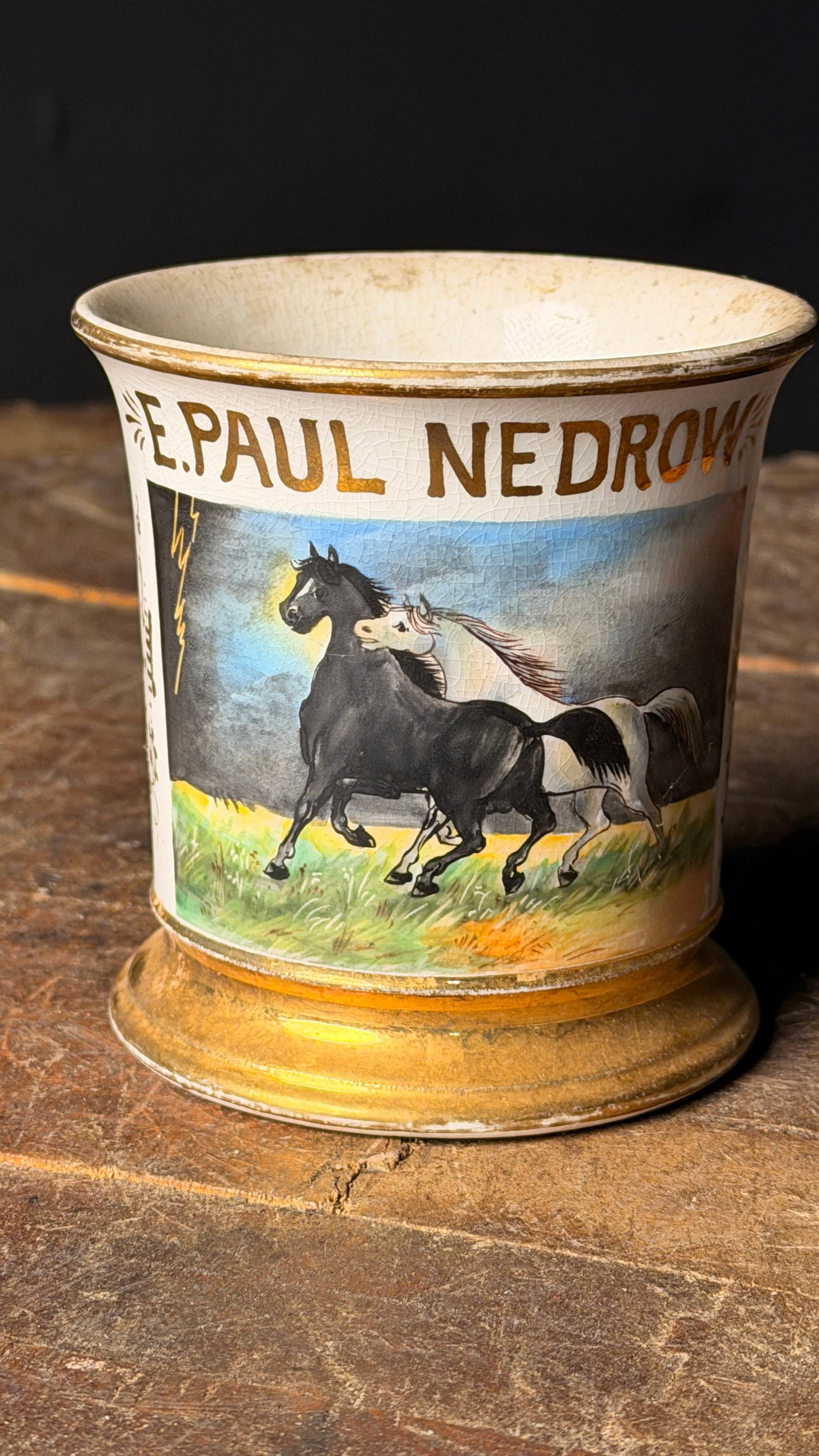 Knowles Taylor and Knowles Occupational Shaving Mug with Pharaohs Horses Motif: This is a personalized occupational shaving mug manufactured by Knowles, Taylor and Knowles of East Liverpool, Ohio. The mug is constructed from a semi-vitreous earthenware body, featuring a flared ri