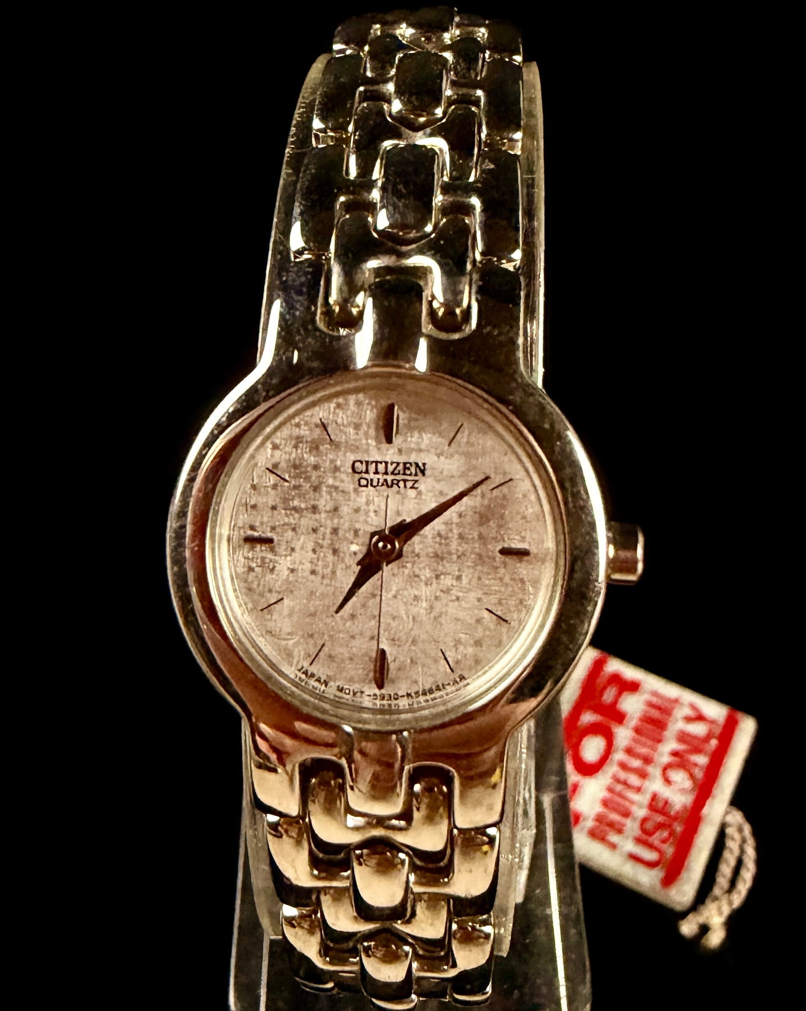 Citizen Ladies Quartz Dress Watch 5930-K18477 CK: Citizen ladies quartz dress watch. This timepiece features a silver-tone base metal case with a matching integrated H-link bracelet. The silver-tone dial displays a fine linen-patterned texture with a