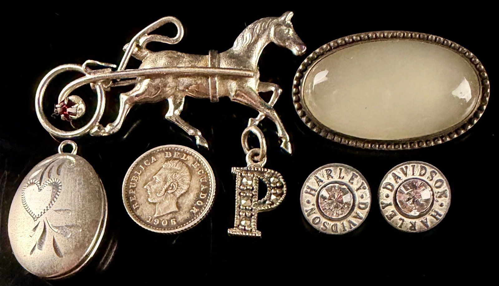 Six Sterling Silver and Collectible Items Including a Horse and Carriage Brooch: This collection consists of six distinct pieces including sterling silver jewelry and collectible accessories. The group features a sterling silver figural brooch depicting a galloping horse pulling a