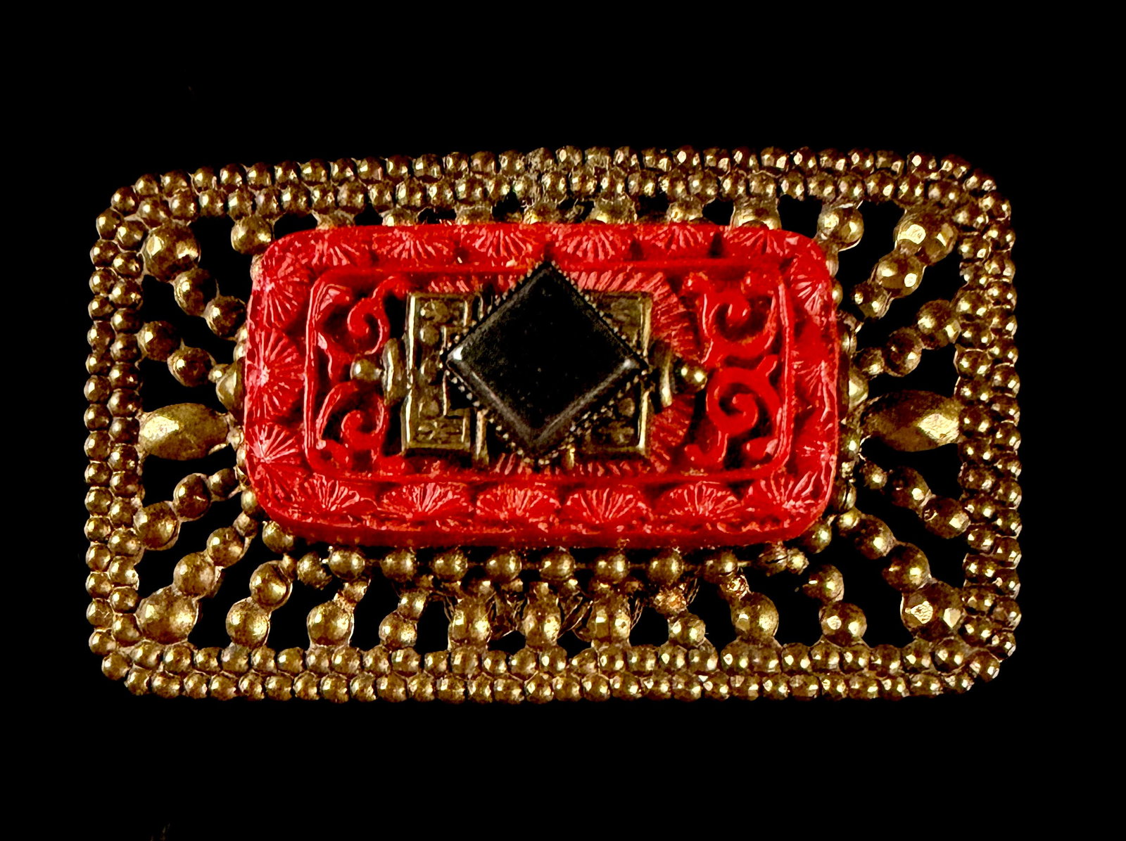 Jan Michaels San Francisco Artisan Mixed Media Cinnabar Style Brooch and Pendant: An artisan mixed-media brooch and pendant by Jan Michaels of San Francisco. The design features a multi-layered construction centered by a rectangular red panel with carved floral and scroll motifs in