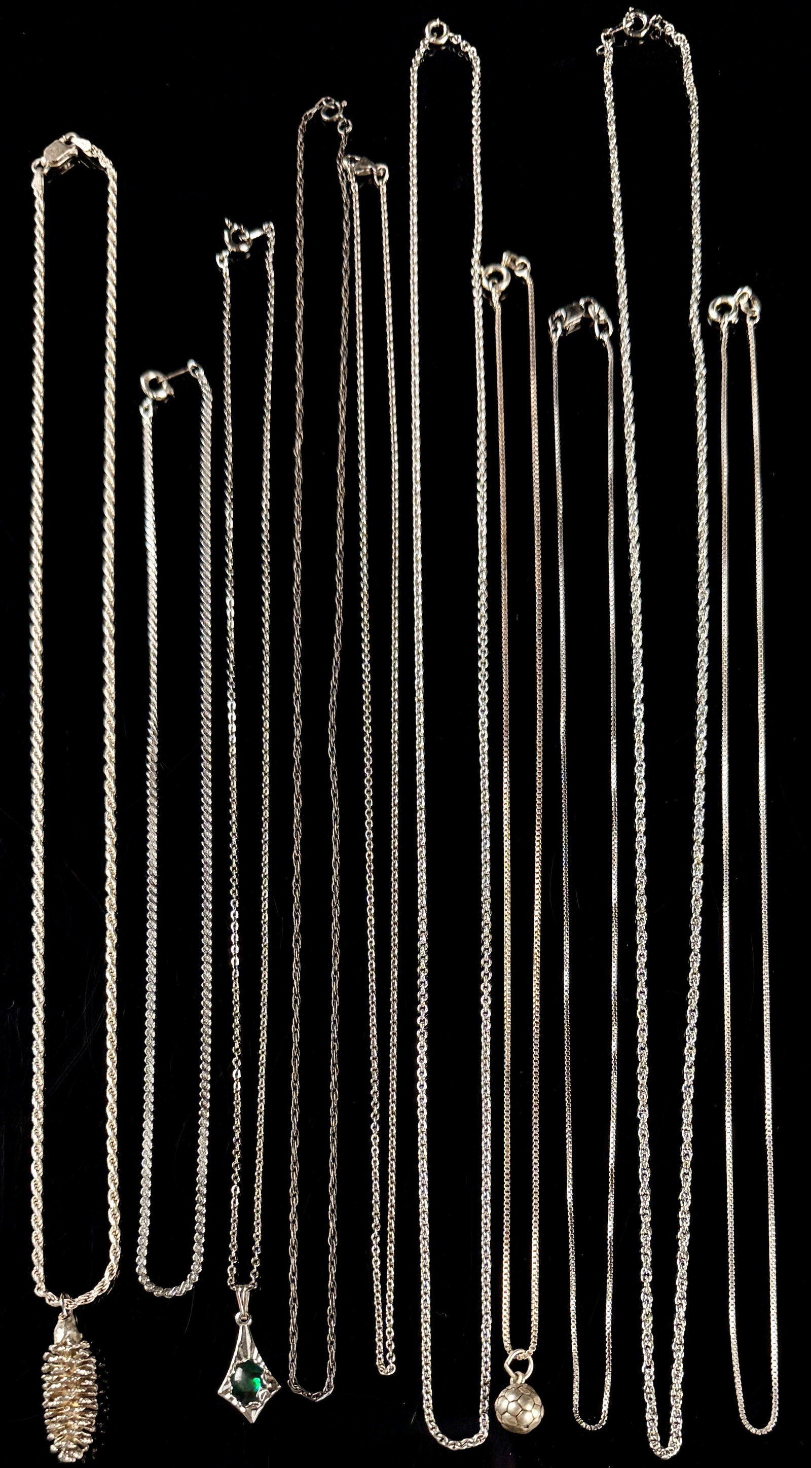 An Assortment of Eleven Sterling Silver Necklaces and Pendants (1 of 9)