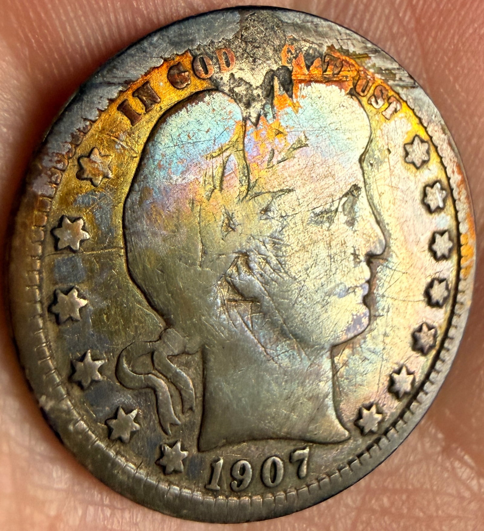1907 US Barber Silver Quarter Dollar: This 1907 United States Barber Quarter Dollar was struck at the Philadelphia Mint. The coin is composed of 90 percent silver and 10 percent copper. The obverse features the Liberty Head design by Char