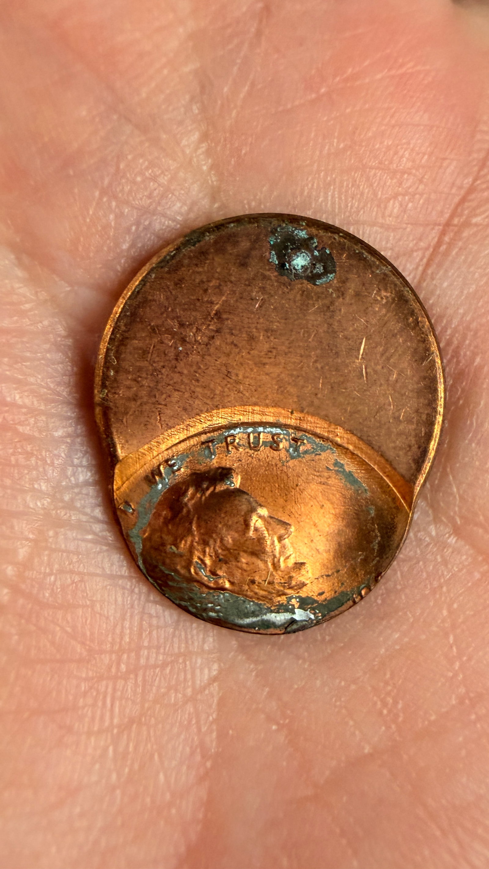 US Lincoln Cent Off-Center Strike Mint Error: This US Lincoln Cent is a major mint error consisting of a strike approximately 60 percent off-center. The coin is struck on a copper-plated zinc planchet. Due to the degree of the offset, the date