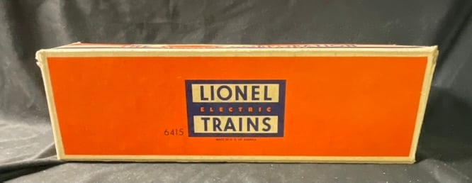 Lionel Postwar O-Gauge No. 6415 Sunoco Triple-Dome Tank Car with Original Box: This is a vintage Lionel O-gauge model train tank car, model number 6415, produced by the Lionel Corporation. The car features a silver-painted plastic triple-dome tank body mounted on a black chassis