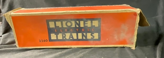 Lionel Postwar No. 2560 Operating Work Crane with Original Box: This O-gauge model train operating work crane was produced by The Lionel Corporation of New York during the postwar era. The model features a painted metal cab and boom mounted on a black die-cast met