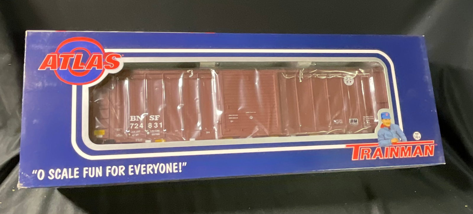 Atlas O Trainman ACF 50'6' Box Car BNSF #724831: This Atlas O Trainman series model railroad box car is an O scale replica of an ACF 50'6" Box Car. The rolling stock is decorated in a reddish-brown oxide paint scheme for the Burlington Northern Sant
