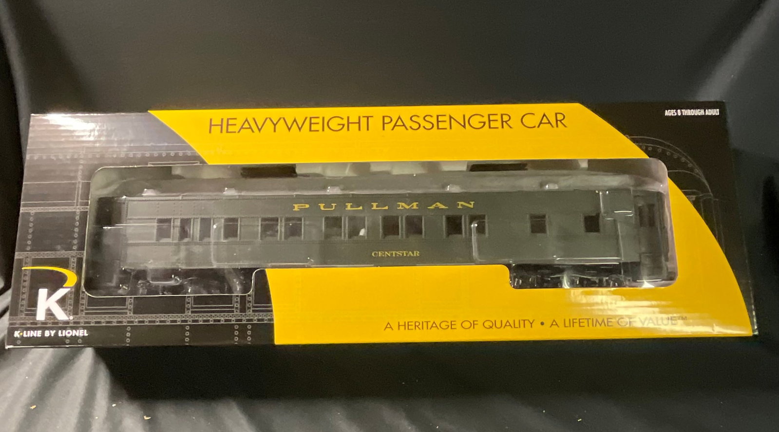 K-Line by Lionel O-Gauge New York Central Centstar Pullman Heavyweight Passenger Car 6-21171: This O-gauge heavyweight passenger car model is manufactured by K-Line by Lionel and decorated for the New York Central railroad. The car features a plastic body with molded rivet detailing, finished 