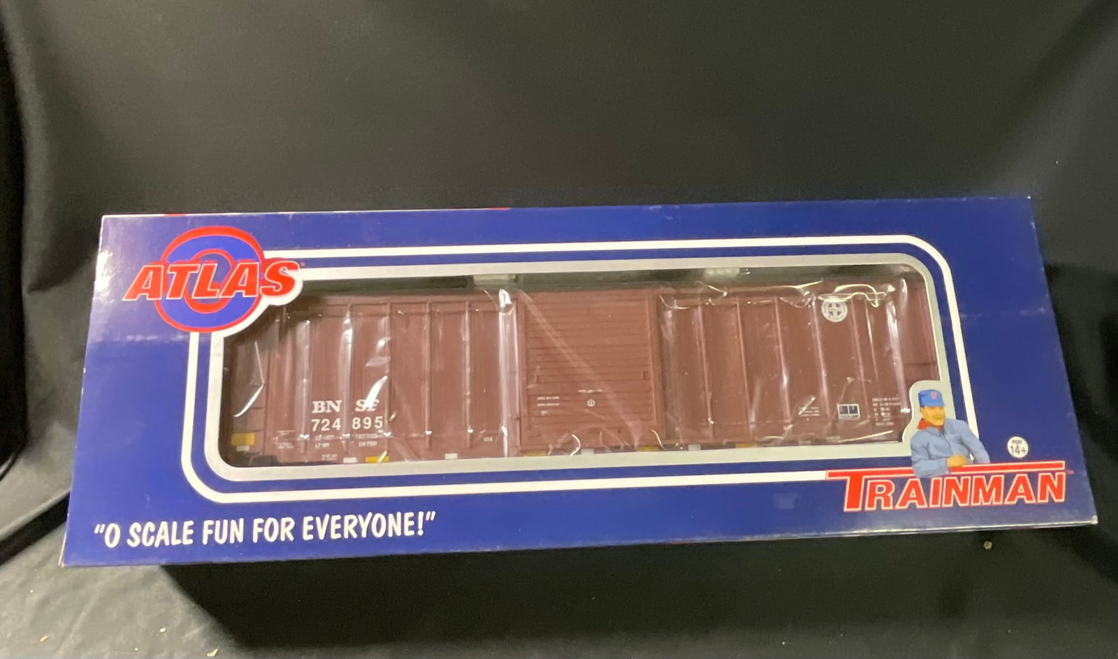 Atlas O Trainman ACF 50 foot 6 inch Box Car BNSF Road Number 724895: This is an O scale model railroad freight car manufactured by the Atlas Model Railroad Co. as part of the Atlas O Trainman product line. The model is an ACF 50 foot 6 inch exterior post box car config